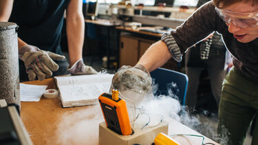 A student conducting an experiment in a lab