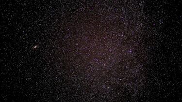 Starry sky, a small galaxy is visible