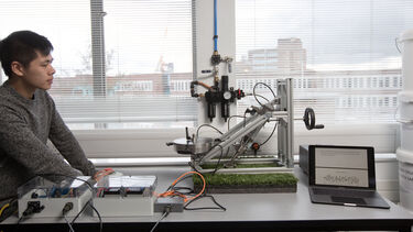 Student conducting experiment in a lab