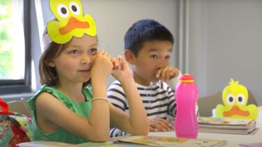 Young pupils in a class