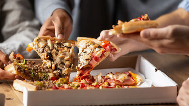 Pizza - students eating pizza