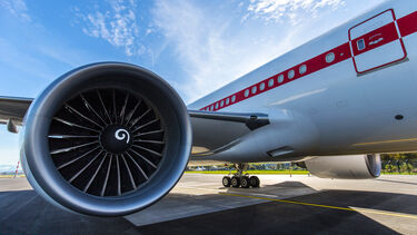 an aeroplane engine against a blue sky