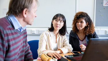 Tutor assist two students