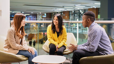 Group of students seated at a table