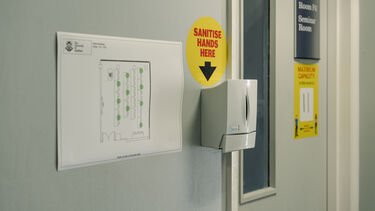 Hicks Building - Hand sanitiser outside seminar room