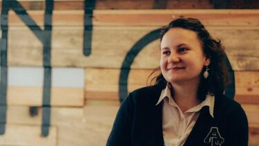 Person holding a laptop