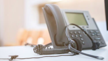 A telephone on a desk