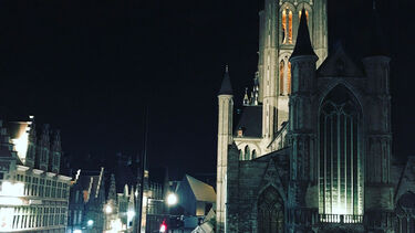 A church and city scene at night