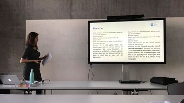 Sarah Muller giving a conference presentation