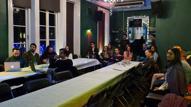 Attendees in a pub for the ADVOCATE outreach event - Meet The Scientist