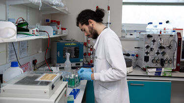 Lab Scientist conducting experiment