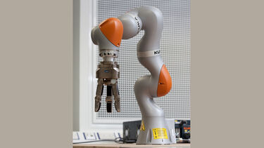 A KUKA LBR iiwa collaborative robot with Schunk 3-finger gripper in the Robot Foundry