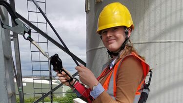 Ella Jones student profile - female in harness and hard hat