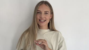 Megan Wood with Dean's List winner's trophy 2020