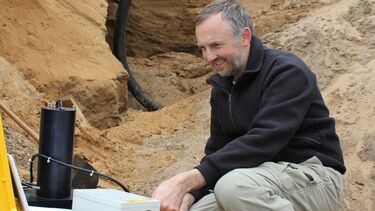 Prof Mark Bateman using a portable luminescence reader 