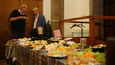 Visitors at the buffet table