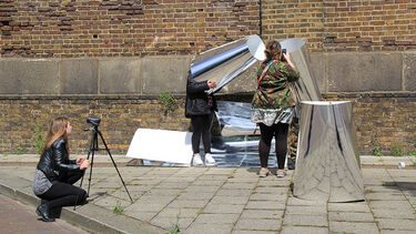 People preparing to start filming