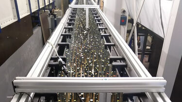 Narrow Gunt flume fitted with artificial vegetation (cylinders) of varying diameter.