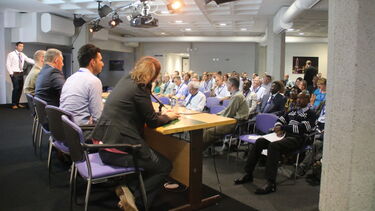 Panel and audience at the in situ conference