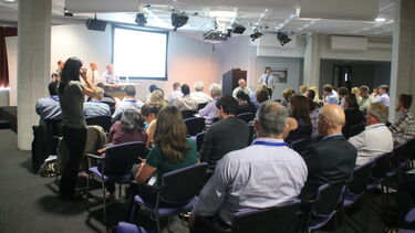 Audience members at the in situ conference