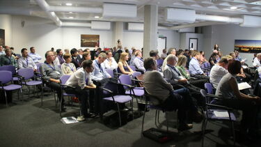 Audience members at the in situ conference