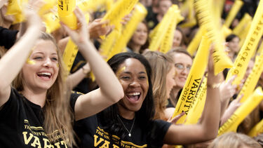 Two students celebrating at the Sheffield Varsity ice hockey game
