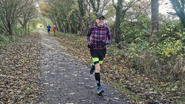 Mike James running a park run