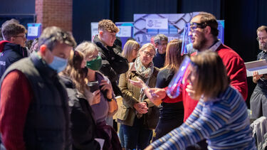 A photo of students at an open day