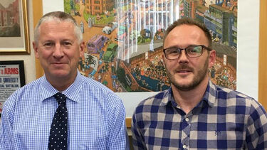 Rick and one of the students he supported through a scholarship to the University 