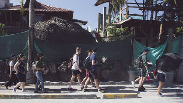 A group of stduents on a field class