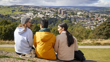 A photo of three students sitting on Bolehills