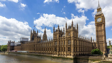 A photo showing the exterior of the house of commons, as well as Big Ben