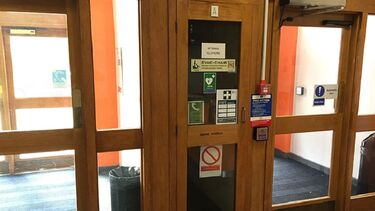 A photo of the Dainton Building showing the location of a defibrillator.