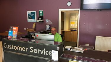 A photo of The Edge reception showing the location of a defibrillator.