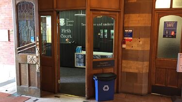 A photo of the Firth Court lobby showing the location of a defibrillator.