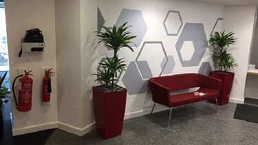 A photo of the Management School showing the location of a defibrillator.