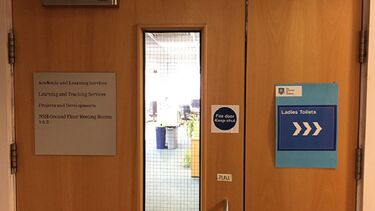 A close-up of New Spring House showing the location of a defibrillator.