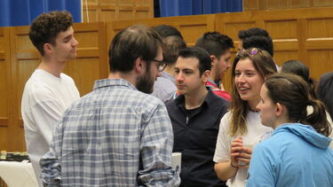 Photo of PhD students networking 