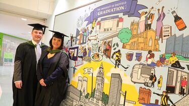 Graduation mural - two students