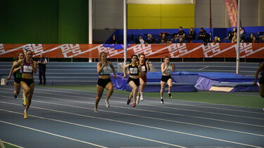 Students competing in running race during Varsity