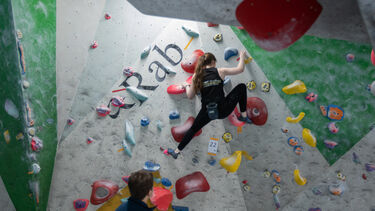 Student on climbing wall