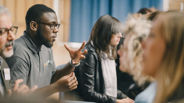 People having a conversation at Ideas Bazaar