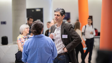 Prof Damien Lacroix and pepole networking at Insigneo Showcase 2022