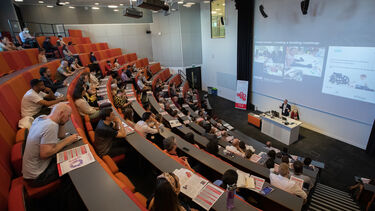 Wide shot of auditorium audience for Paul Dimitri talk at Insigneo Showcase 2022