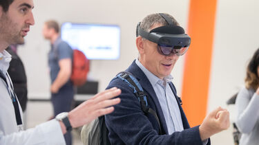 Dr John Fenner wearing VR headset at Insigneo Showcase 2022