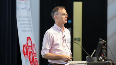 Andy Parker, Professor of High Energy Physics at the University of Cambridge speaking at Insigneo Showcase 2022