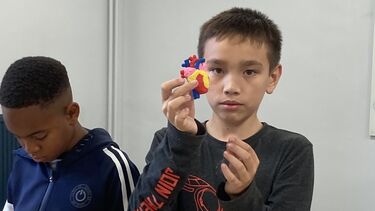 Kid with heart model