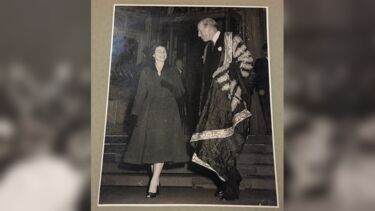 Her Majesty the Queen leaving the University, accompanied by the Chancellor.