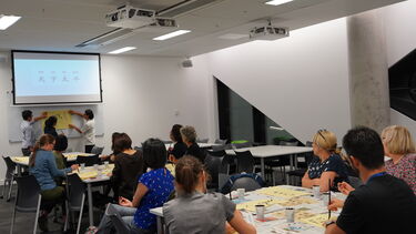 Students enjoy calligraphy demonstration
