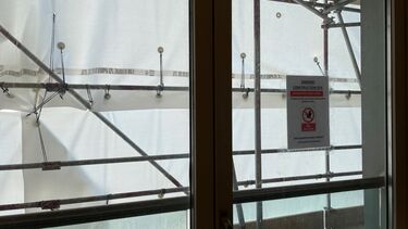 A view from behind plastic sheeting - inside a leaseholder's flat undergoing cladding remediation works.